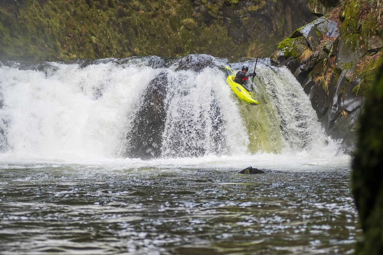 Photograph of essay author Ken Kullby kayaking.